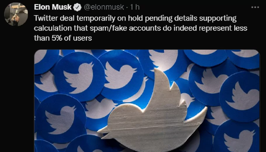 Twitter (TWTR34): Elon Musk diz que suspendeu temporariamente as negociações para compra da empresa. Imagem traz print de tuite que diz: "“O acordo está temporariamente suspenso devido à falta de detalhes que expliquem o cálculo de que as contas fake ou de spam representam de fato menos de 5% dos usuários”"