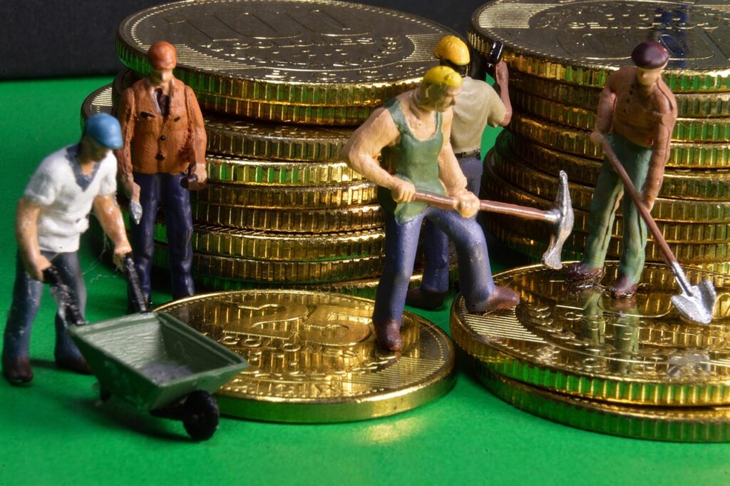 Imagem mostra bonecos trabalhando e construindo riqueza.