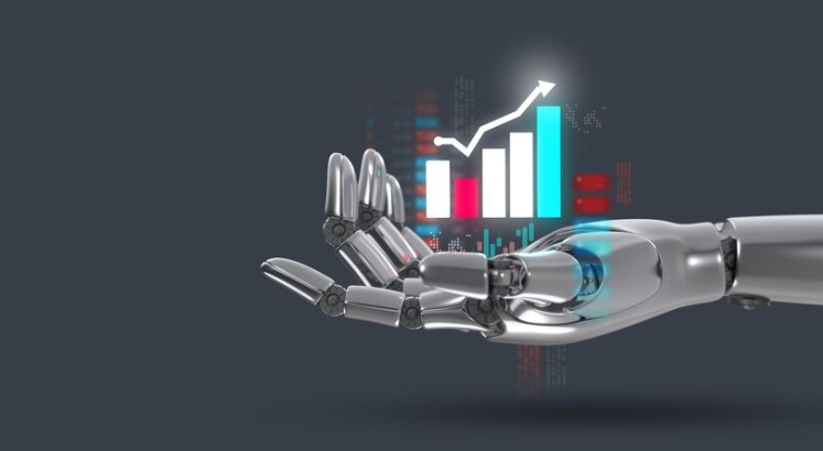 Carteira Recomendada Automatizada de FIIs: imagem de mão de robô com gráfico de ações