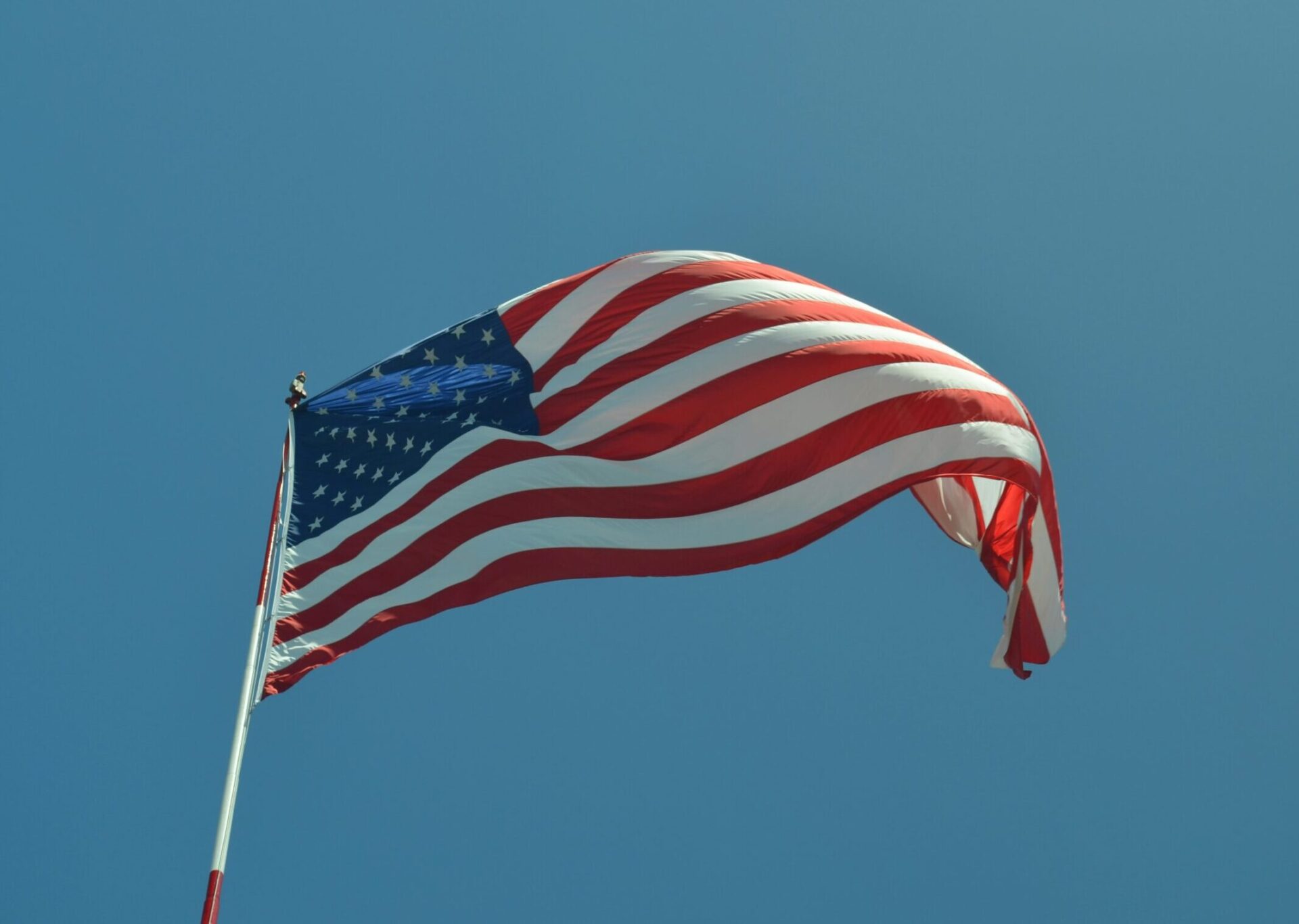 Imagem da bandeira dos EUA: PMI Composto dos EUA fica em 51,4 em fevereiro, em leitura preliminar
