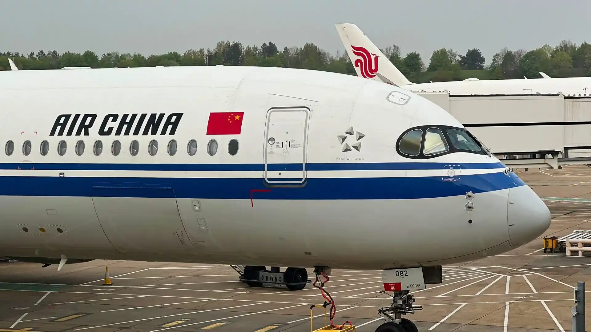 Avião da Air China, representando a negociação de jatos Airbus na China